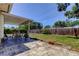 Backyard with stone-floored patio and comfortable seating provides an enjoyable outdoor living space at 2800 54Th N St, St Petersburg, FL 33710