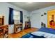 Bedroom with wood floors, a closet, and natural light from a window at 2800 54Th N St, St Petersburg, FL 33710