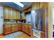 Updated kitchen features granite counters, wood cabinets, stainless steel appliances, and modern finishes at 2800 54Th N St, St Petersburg, FL 33710
