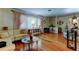 Bright and airy living room with hardwood floors, large windows, and classic, inviting decor at 2800 54Th N St, St Petersburg, FL 33710