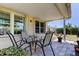 Covered patio with stone flooring and outdoor seating providing a pleasant outdoor living space at 2800 54Th N St, St Petersburg, FL 33710
