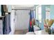 Bathroom featuring a tiled shower, decorative towels, and a vanity with countertop at 2810 9Th St, Englewood, FL 34224