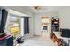 Bright dining area with large windows and a view of the laundry room and backyard at 2810 9Th St, Englewood, FL 34224