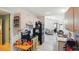 Kitchen with modern appliances, white cabinets, and adjacent living area at 2810 9Th St, Englewood, FL 34224