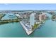 Overhead shot of condo building with marina, parking, and surrounding waterfront cityscape at 31 Island Way # 1507, Clearwater Beach, FL 33767