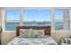 Inviting bedroom view features picturesque oceanfront views through large windows, highlighting a relaxing atmosphere at 31 Island Way # 1507, Clearwater Beach, FL 33767