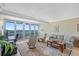 Living room with panoramic water views, comfortable seating, and a decorative area rug at 31 Island Way # 1507, Clearwater Beach, FL 33767