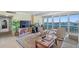 Spacious living room with floor-to-ceiling windows offering panoramic views of the city skyline at 31 Island Way # 1507, Clearwater Beach, FL 33767