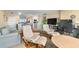 Comfortable living room with plush seating, water views, and open access to the dining and kitchen areas at 31 Island Way # 1507, Clearwater Beach, FL 33767
