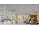 Bright and spacious lobby with comfortable seating, tile flooring, and large windows offering scenic water views at 31 Island Way # 1507, Clearwater Beach, FL 33767