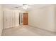 Bedroom featuring double closet and a view into an adjacent room at 3128 59Th S St # 206, Gulfport, FL 33707