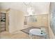 Inviting living area with plush carpeting, open layout, and bright natural light at 3128 59Th S St # 206, Gulfport, FL 33707