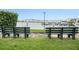 Picturesque waterfront with benches overlooking boats docked at the marina, a serene spot for relaxation at 3128 59Th S St # 206, Gulfport, FL 33707