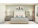 Serene bedroom with a comfortable bed, soft lighting, and elegant bedside tables at 32078 Griffin Sands Ln, San Antonio, FL 33576