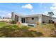 Expansive backyard featuring a patio and well-maintained landscaping perfect for outdoor relaxation and entertaining at 3353 Montano Ave, Spring Hill, FL 34609