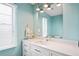 Bright bathroom with a modern vanity, mirror and updated fixtures at 3353 Montano Ave, Spring Hill, FL 34609
