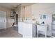 Functional laundry area featuring a washer, dryer, and utility sink for convenience at 3353 Montano Ave, Spring Hill, FL 34609