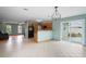 The kitchen and living room layout makes this space conducive to both cooking and entertaining Gathering and friends at 3353 Montano Ave, Spring Hill, FL 34609