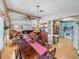 Open-concept dining room connecting to the living room and kitchen areas at 35051 Colony Hills Dr, Zephyrhills, FL 33541