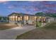 Charming single-story home with a covered parking area, inviting curb appeal, and a cozy front porch at 35051 Colony Hills Dr, Zephyrhills, FL 33541