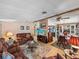 Cozy living room seamlessly connecting to the dining area, creating a warm and inviting atmosphere at 35051 Colony Hills Dr, Zephyrhills, FL 33541