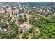 An expansive aerial view of the community featuring lush landscapes and homes nestled amongst trees at 403 Westbrook Ave, Brandon, FL 33511