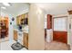 Another view of the kitchen with white appliances. Dining room visible in the background at 403 Westbrook Ave, Brandon, FL 33511