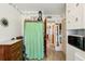 Practical laundry area featuring a washing machine, storage, and access to other areas at 403 Westbrook Ave, Brandon, FL 33511