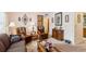 Warm and inviting living room with classic decor, comfortable seating, and ample natural light, creating a cozy atmosphere at 403 Westbrook Ave, Brandon, FL 33511