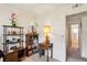 Cozy living room with shelving unit, displaying various decorative items and books at 403 Westbrook Ave, Brandon, FL 33511