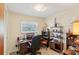 A well-organized home office with a desk, chair, and shelving units for storage at 403 Westbrook Ave, Brandon, FL 33511