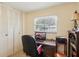 Comfortable home office featuring a work desk, computer, and a window at 403 Westbrook Ave, Brandon, FL 33511