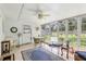 Sun Room featuring tile flooring and many windows overlooking the backyard at 403 Westbrook Ave, Brandon, FL 33511