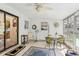 Sun Room featuring tile flooring and many windows overlooking the backyard at 403 Westbrook Ave, Brandon, FL 33511