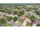 A residential neighborhood with mature trees, well-maintained homes, and lush green lawns, offering a peaceful and Gathering-friendly environment at 4511 Swift Cir, Valrico, FL 33596