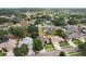 A residential neighborhood with mature trees, well-maintained homes, and lush green lawns, offering a peaceful and Gathering-friendly environment at 4511 Swift Cir, Valrico, FL 33596