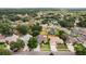 A residential neighborhood with mature trees, well-maintained homes, and lush green lawns, offering a peaceful and Gathering-friendly environment at 4511 Swift Cir, Valrico, FL 33596