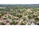 A residential neighborhood with mature trees, well-maintained homes, and lush green lawns, offering a peaceful and Gathering-friendly environment at 4511 Swift Cir, Valrico, FL 33596