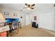 Bedroom or office space featuring carpet, ceiling fan, and closet storage at 4511 Swift Cir, Valrico, FL 33596