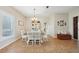 Open dining space with tile flooring, bright window light, and tasteful decor at 4511 Swift Cir, Valrico, FL 33596