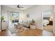 Cozy living room with stylish decor and a view of the screened-in patio at 4511 Swift Cir, Valrico, FL 33596