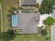 An aerial view showcasing the property with a screened-in pool and manicured landscaping at 4535 29Th Avenue E Cir, Palmetto, FL 34221