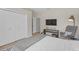 Cozy bedroom featuring a bed, closet, and decoratively furnished with neutral colors at 4535 29Th Avenue E Cir, Palmetto, FL 34221