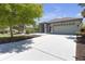 Well-maintained one-story home featuring a manicured front yard and a large driveway at 4535 29Th Avenue E Cir, Palmetto, FL 34221