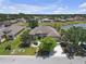 Charming home featuring mature trees, lush landscaping, and a welcoming entrance at 4535 29Th Avenue E Cir, Palmetto, FL 34221