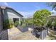 Lush garden with raised beds and stone path adds charm to the property at 4535 29Th Avenue E Cir, Palmetto, FL 34221
