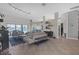 Spacious living room with tile flooring, modern lighting, and a comfortable seating area at 4535 29Th Avenue E Cir, Palmetto, FL 34221