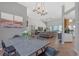 Open-concept living space connecting dining area to the main living room at 4535 29Th Avenue E Cir, Palmetto, FL 34221