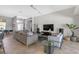 Bright living room with neutral colors, tile floors, and modern furnishings at 4535 29Th Avenue E Cir, Palmetto, FL 34221