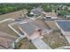 Single story home features fenced yard, attached garage, and mature trees for added privacy and shade at 4617 Horseshoe Pick Ln, Valrico, FL 33594